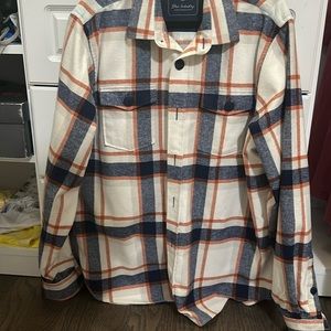White orange and blue flannel